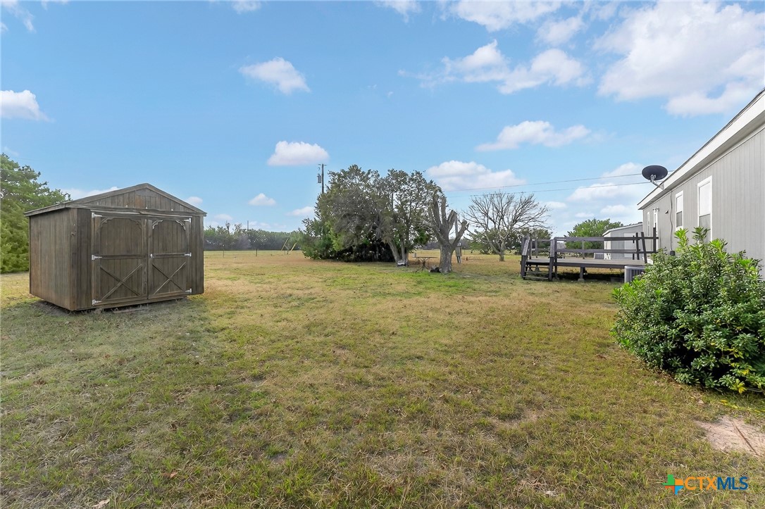 11213 Ridgewood Drive Salado, TX 76571 - Photo 22 of 24 a view of a dry yard and mountain