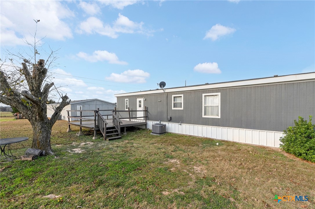 11213 Ridgewood Drive Salado, TX 76571 - Photo 23 of 24 a view of a house with backyard porch and sitting area