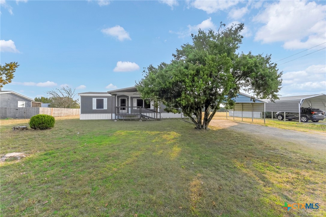 11213 Ridgewood Drive Salado, TX 76571 - Photo 3 of 24 a view of a house with a backyard