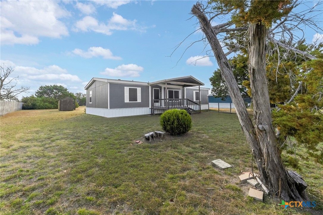 11213 Ridgewood Drive Salado, TX 76571 - Photo 4 of 24 a view of a house with a yard