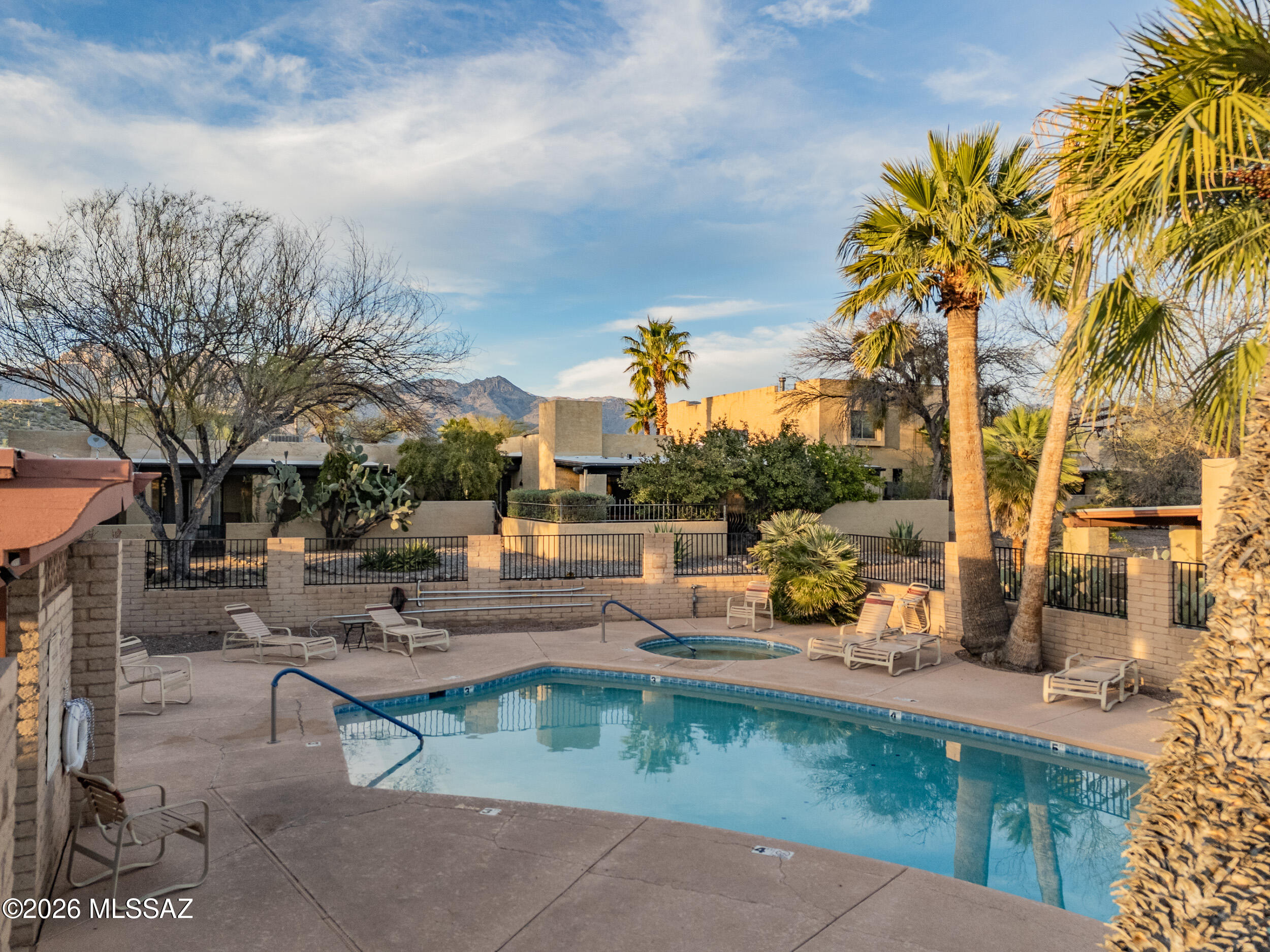 6941 East Rivercrest Road Tucson, AZ 85750 - Photo 29 of 32 a view of a patio with swimming pool