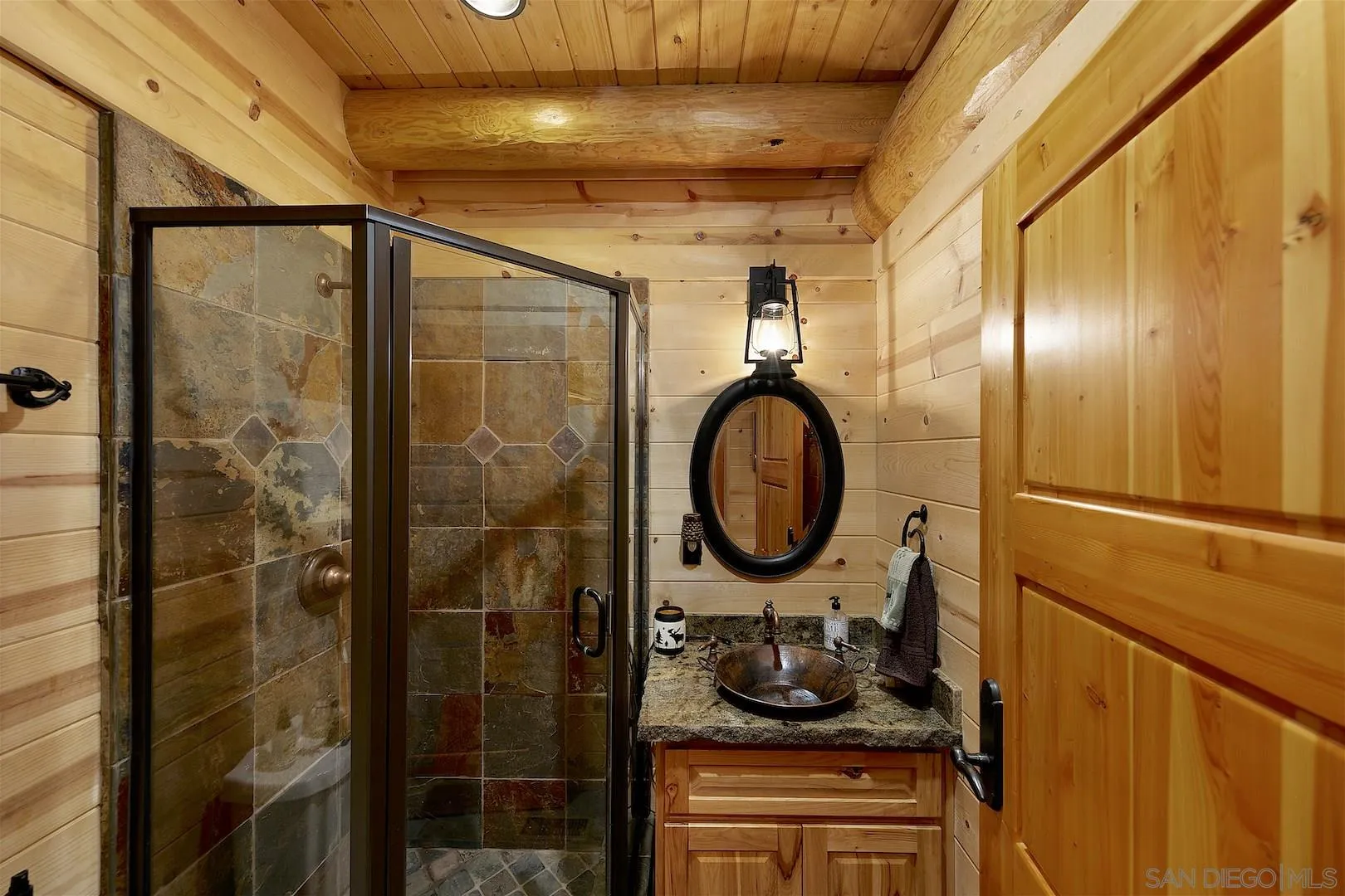 218 Frances Drive El Cajon, CA 92019 - Photo 23 of 56 a close view of a bathroom sink and a mirror