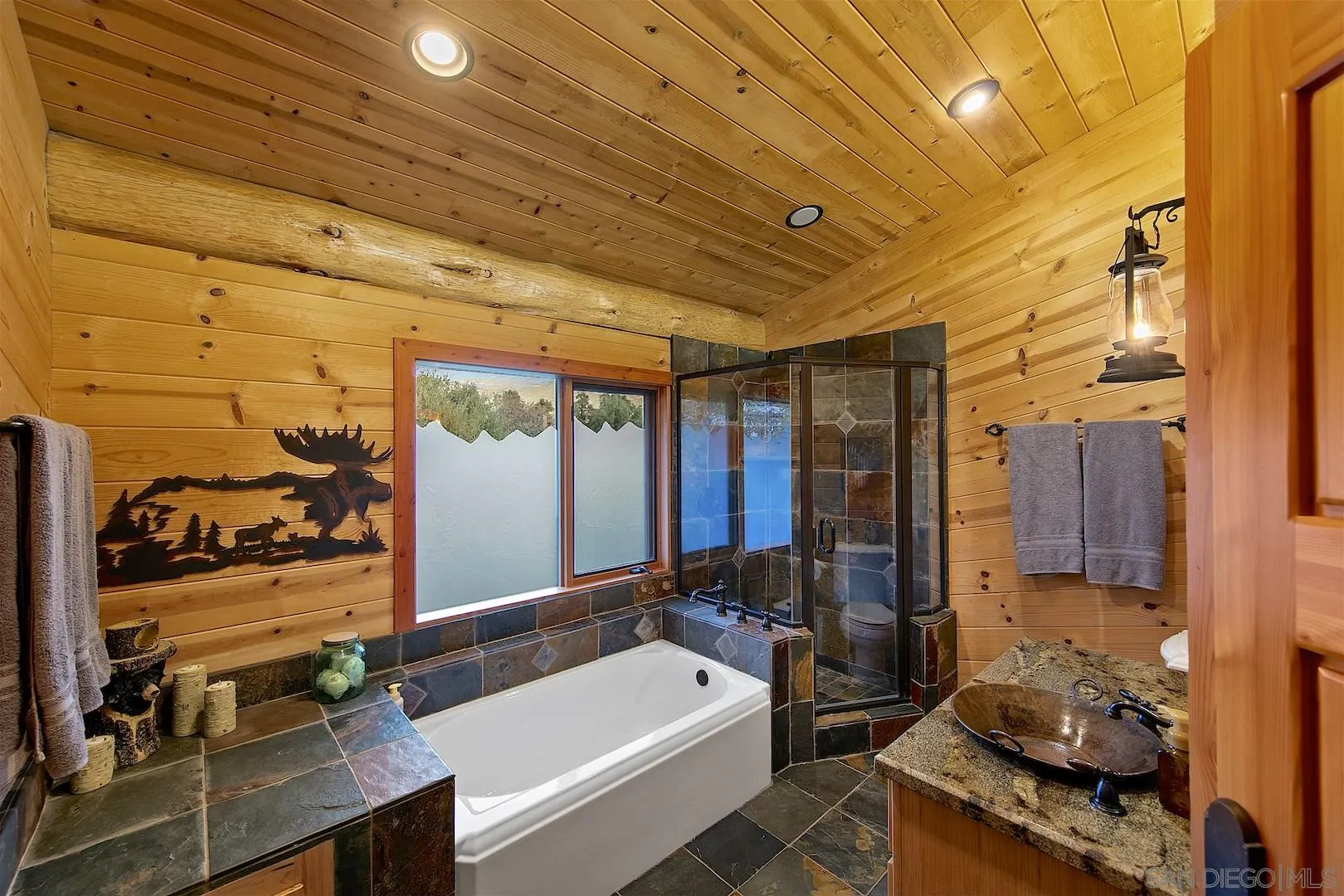 218 Frances Drive El Cajon, CA 92019 - Photo 35 of 56 a bathroom with a tub a sink and a shower