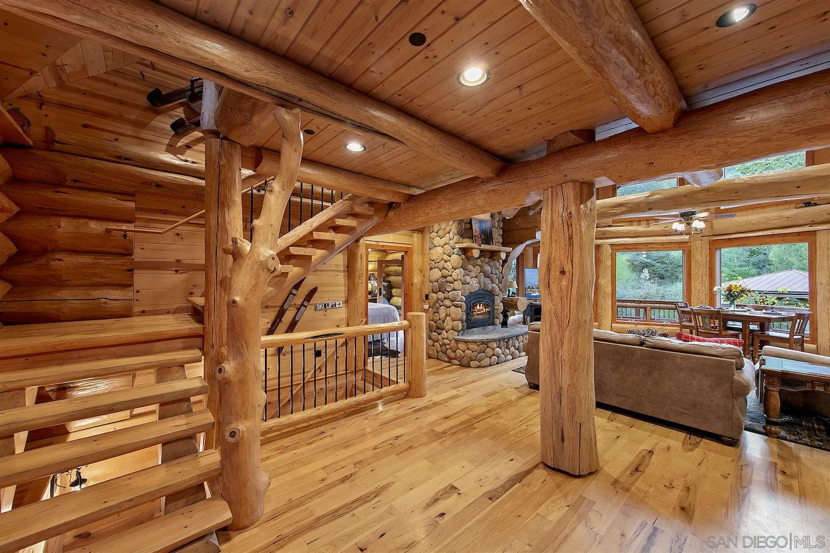 218 Frances Drive El Cajon, CA 92019 - Photo 43 of 56 a view of an empty room with wooden floor and windows