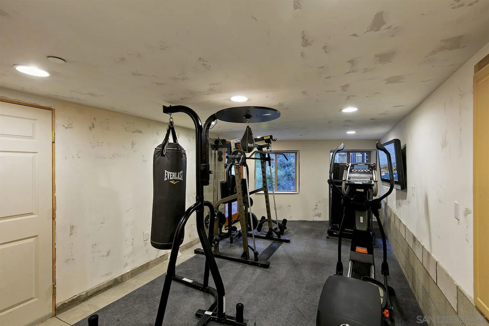 218 Frances Drive El Cajon, CA 92019 - Photo 44 of 56 a view of a room with gym equipment