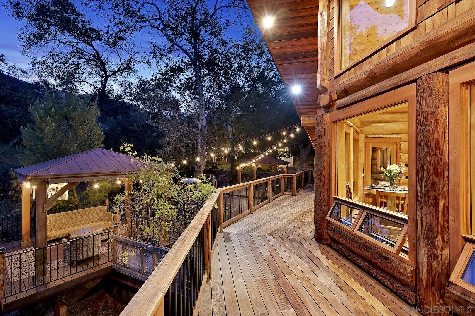 218 Frances Drive El Cajon, CA 92019 - Photo 5 of 56 a view of a balcony with chairs and wooden floor
