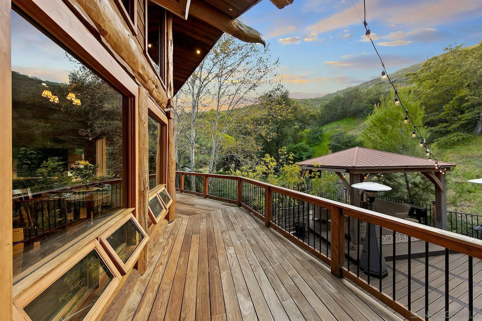 218 Frances Drive El Cajon, CA 92019 - Photo 7 of 56 a view of balcony with chairs and wooden floor