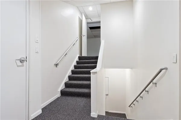 a view of hallway with stairs