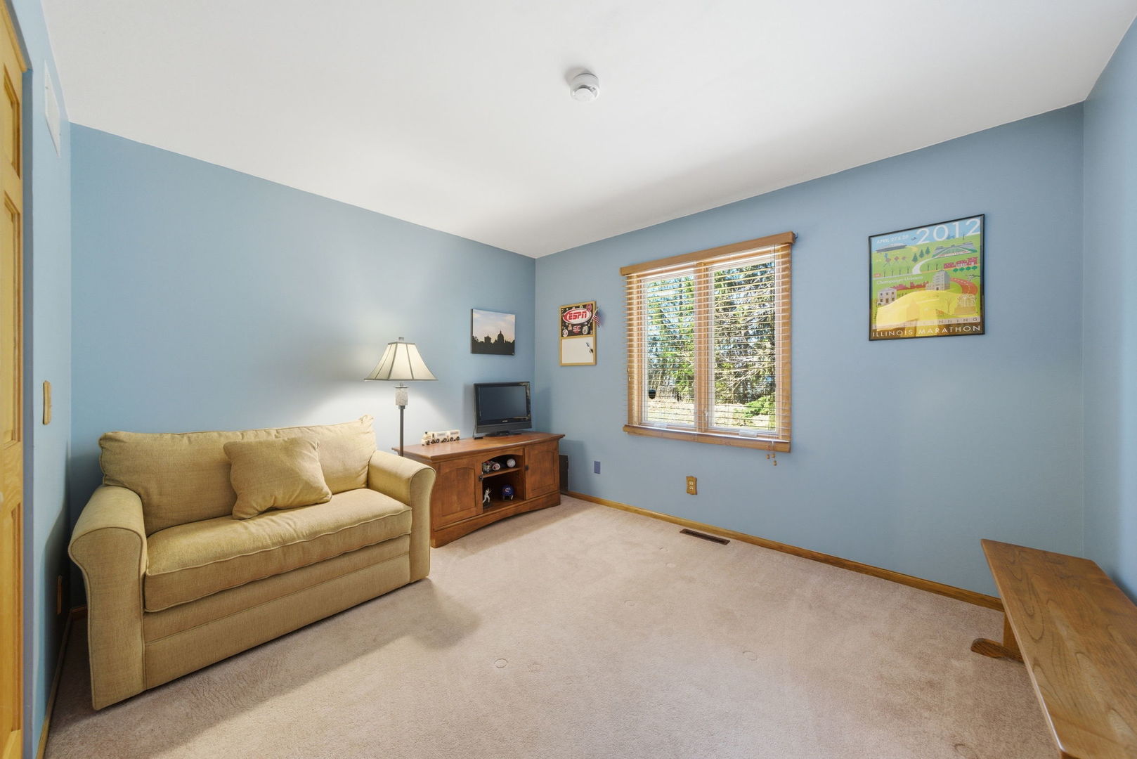 1839 Kerrybrook Court Sycamore, IL 60178 - Photo 16 of 25 a living room with furniture and a window
