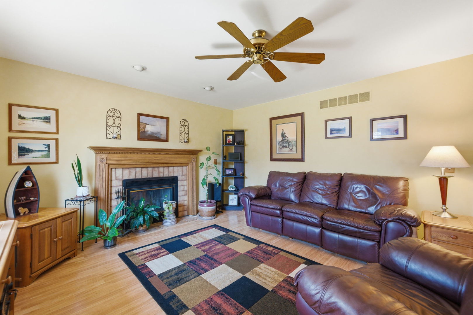 1839 Kerrybrook Court Sycamore, IL 60178 - Photo 7 of 25 a living room with furniture and a fireplace