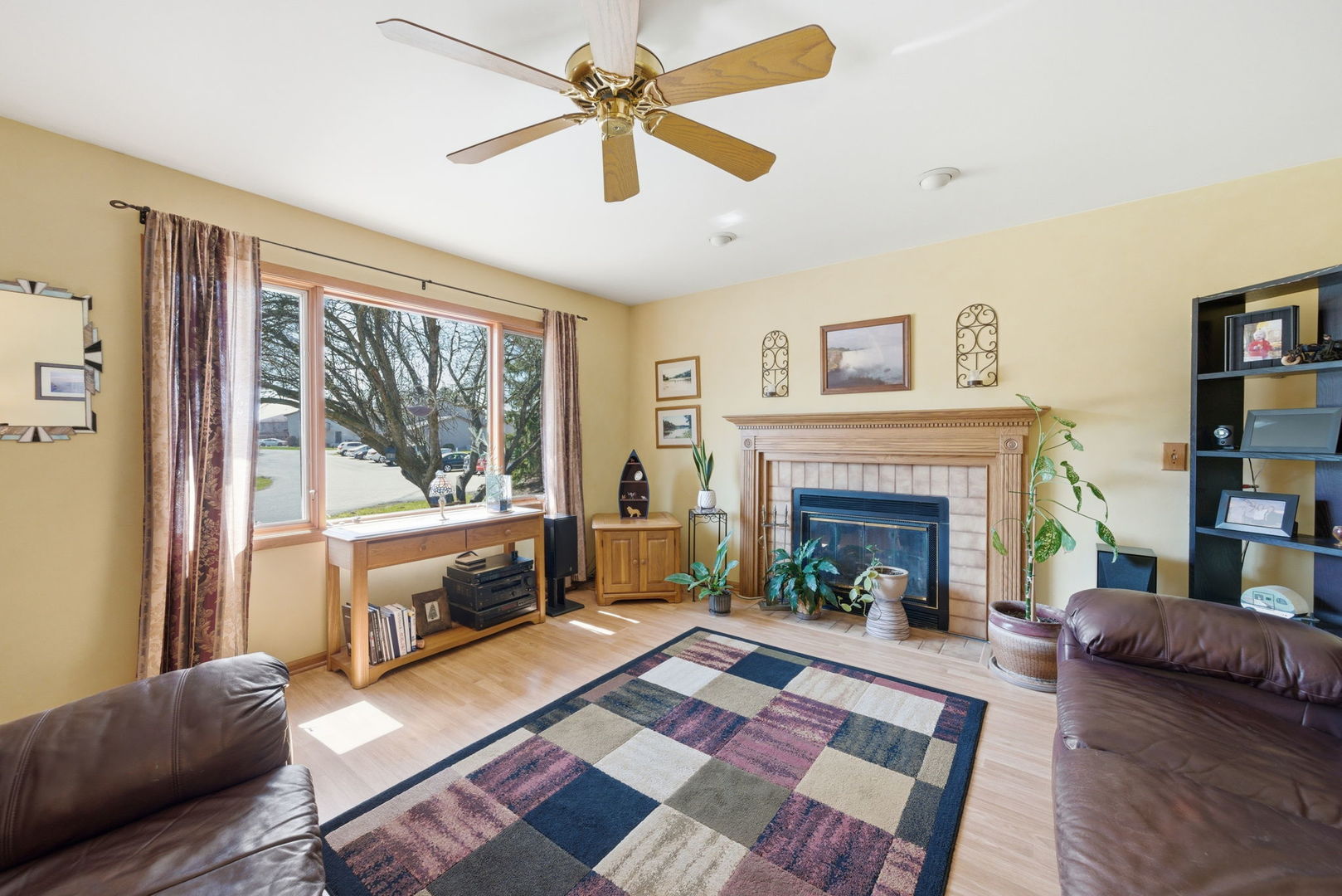 1839 Kerrybrook Court Sycamore, IL 60178 - Photo 9 of 25 a living room with furniture and a fireplace