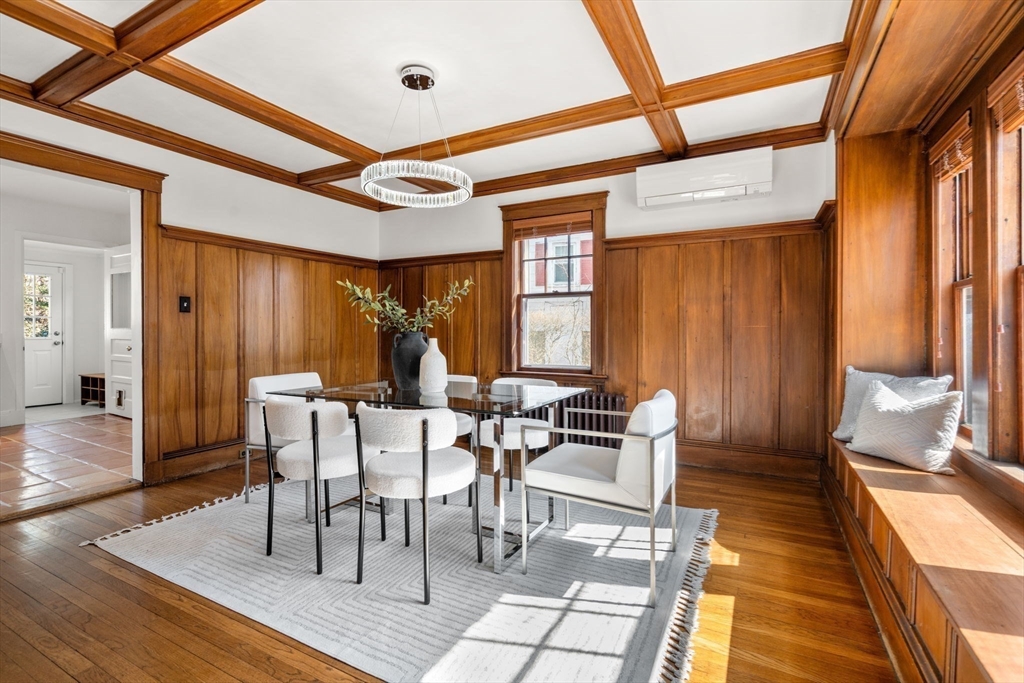 65 Bothfeld Road Newton, MA 02459 - Photo 13 of 31 a view of a dining room with furniture window and wooden floor