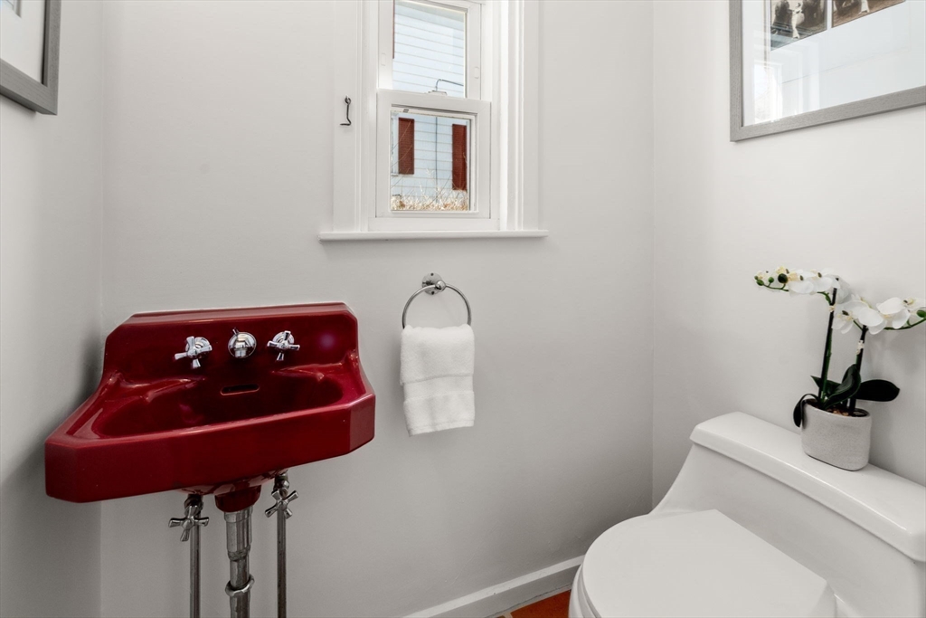 65 Bothfeld Road Newton, MA 02459 - Photo 16 of 31 a bathroom with a toilet and sink