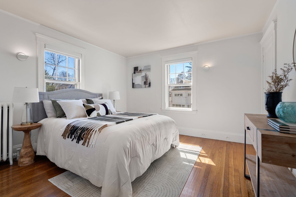 65 Bothfeld Road Newton, MA 02459 - Photo 18 of 31 a bedroom with bed and wooden floor