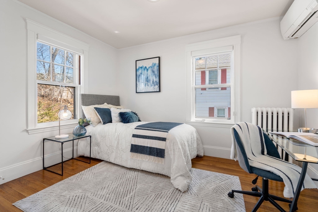 65 Bothfeld Road Newton, MA 02459 - Photo 19 of 31 a bedroom with a bed and a window