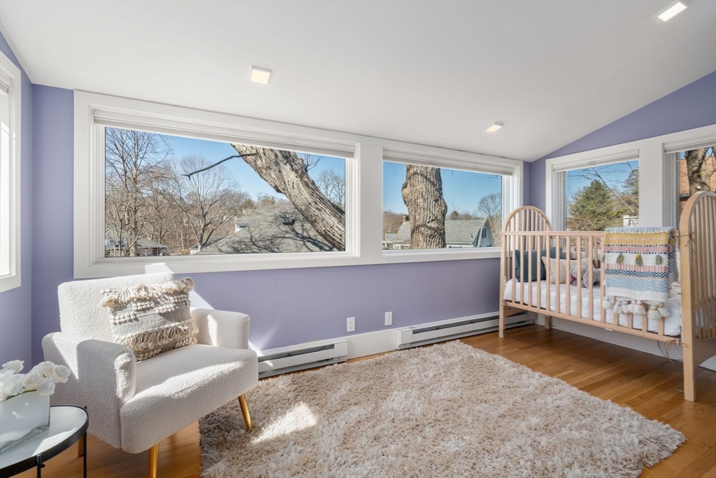 65 Bothfeld Road Newton, MA 02459 - Photo 20 of 31 a bedroom with furniture and a window