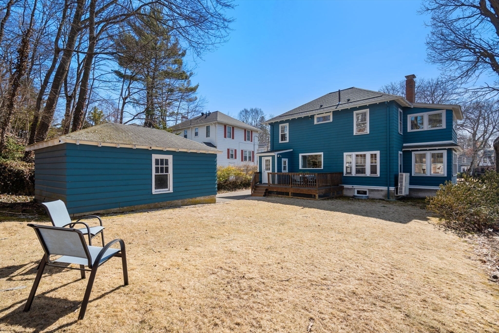 65 Bothfeld Road Newton, MA 02459 - Photo 29 of 31 a view of a house with a yard