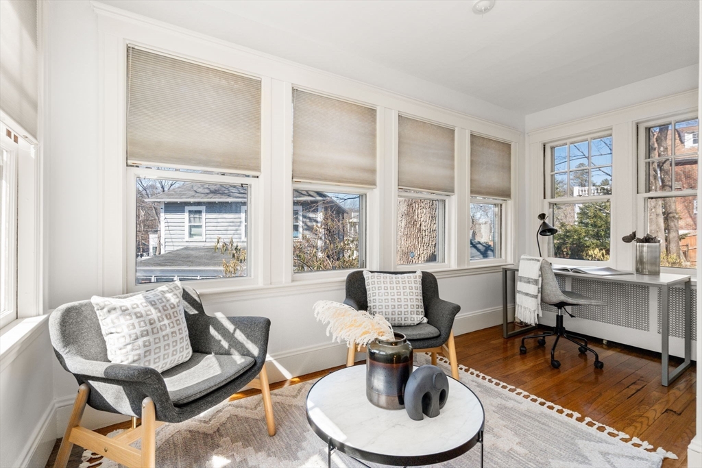65 Bothfeld Road Newton, MA 02459 - Photo 7 of 31 a living room with furniture and a large window