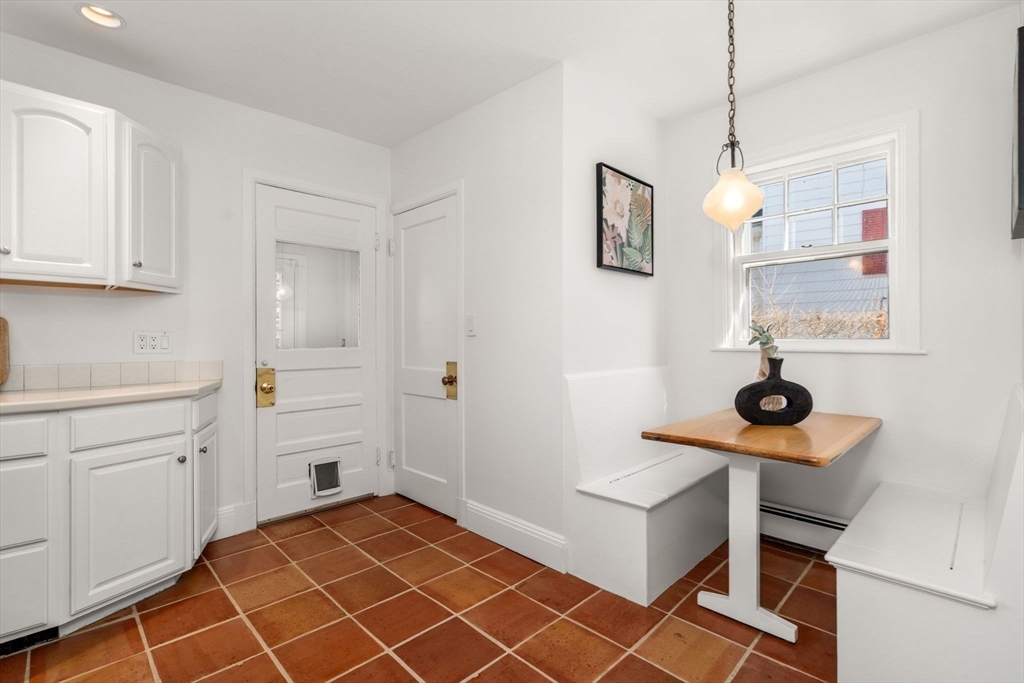 65 Bothfeld Road Newton, MA 02459 - Photo 10 of 31 a view of a room with shelves and wooden floor