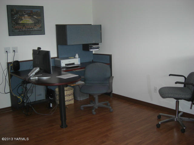 13907 Fisk Road Yakima, WA 98908 - Photo 30 of 55 a workspace with furniture and wooden floor