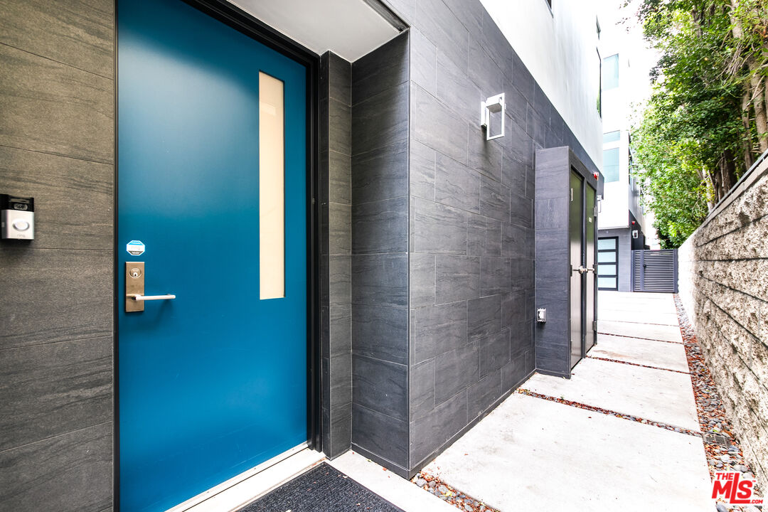 1951 Manning Avenue Los Angeles, CA 90025 - Photo 2 of 27 a view of a wooden door