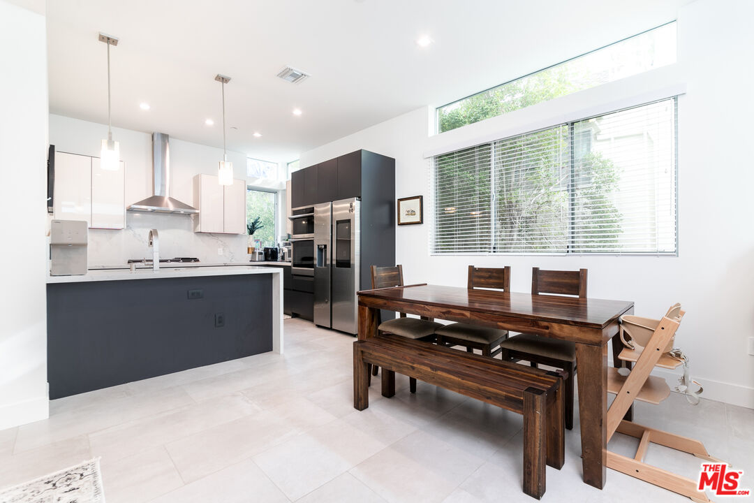 1951 Manning Avenue Los Angeles, CA 90025 - Photo 6 of 27 a kitchen with a sink appliances and a window
