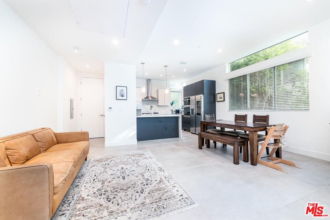 1951 Manning Avenue Los Angeles, CA 90025 - Photo 7 of 27 a living room with furniture and a large window