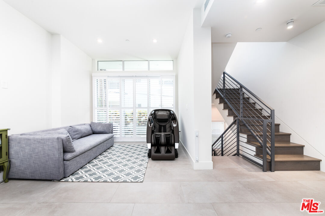 1951 Manning Avenue Los Angeles, CA 90025 - Photo 8 of 27 a living room with furniture and white walls