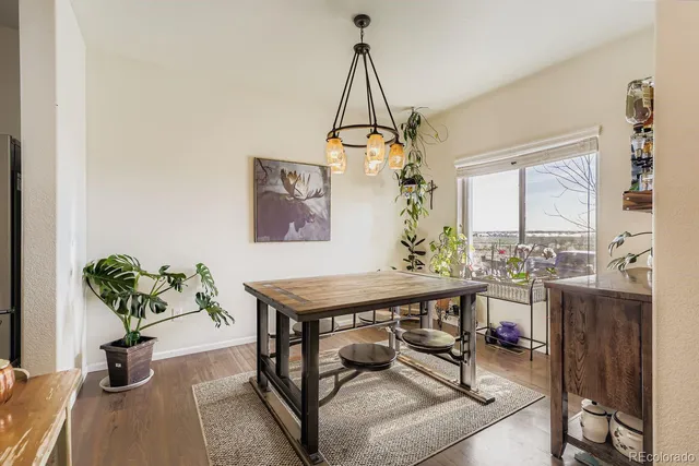 a view of a livingroom with furniture and window