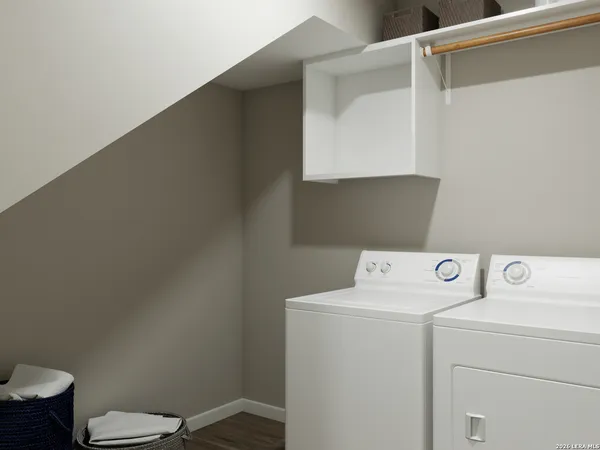 a utility room with dryer and washer
