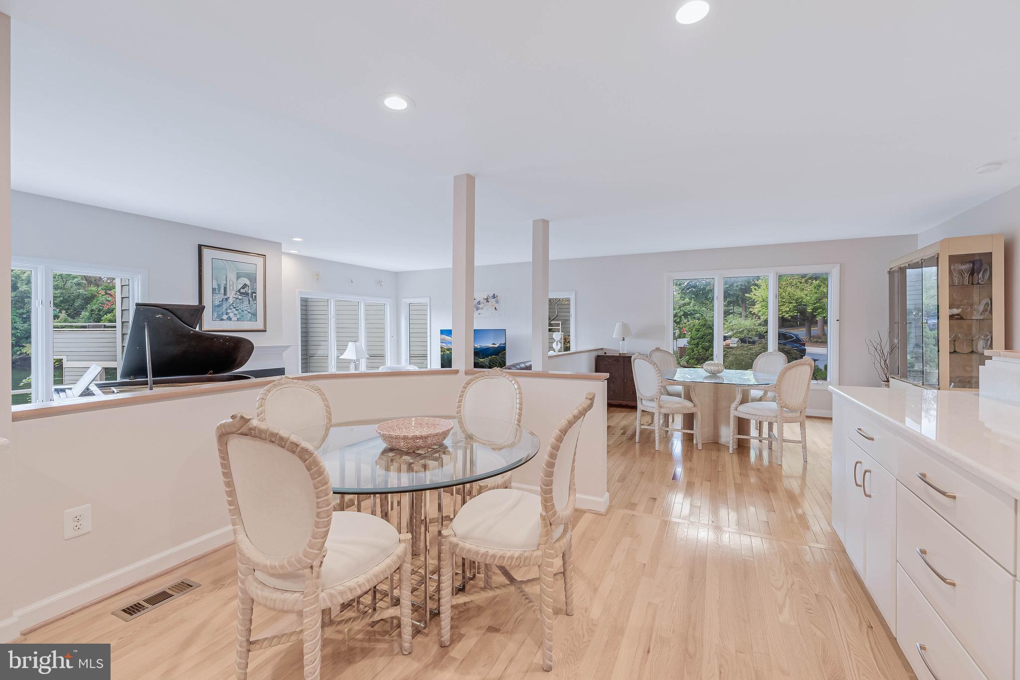 1933 Lakeport Way Reston, VA 20191 - Photo 12 of 57 a dining room with furniture and wooden floor