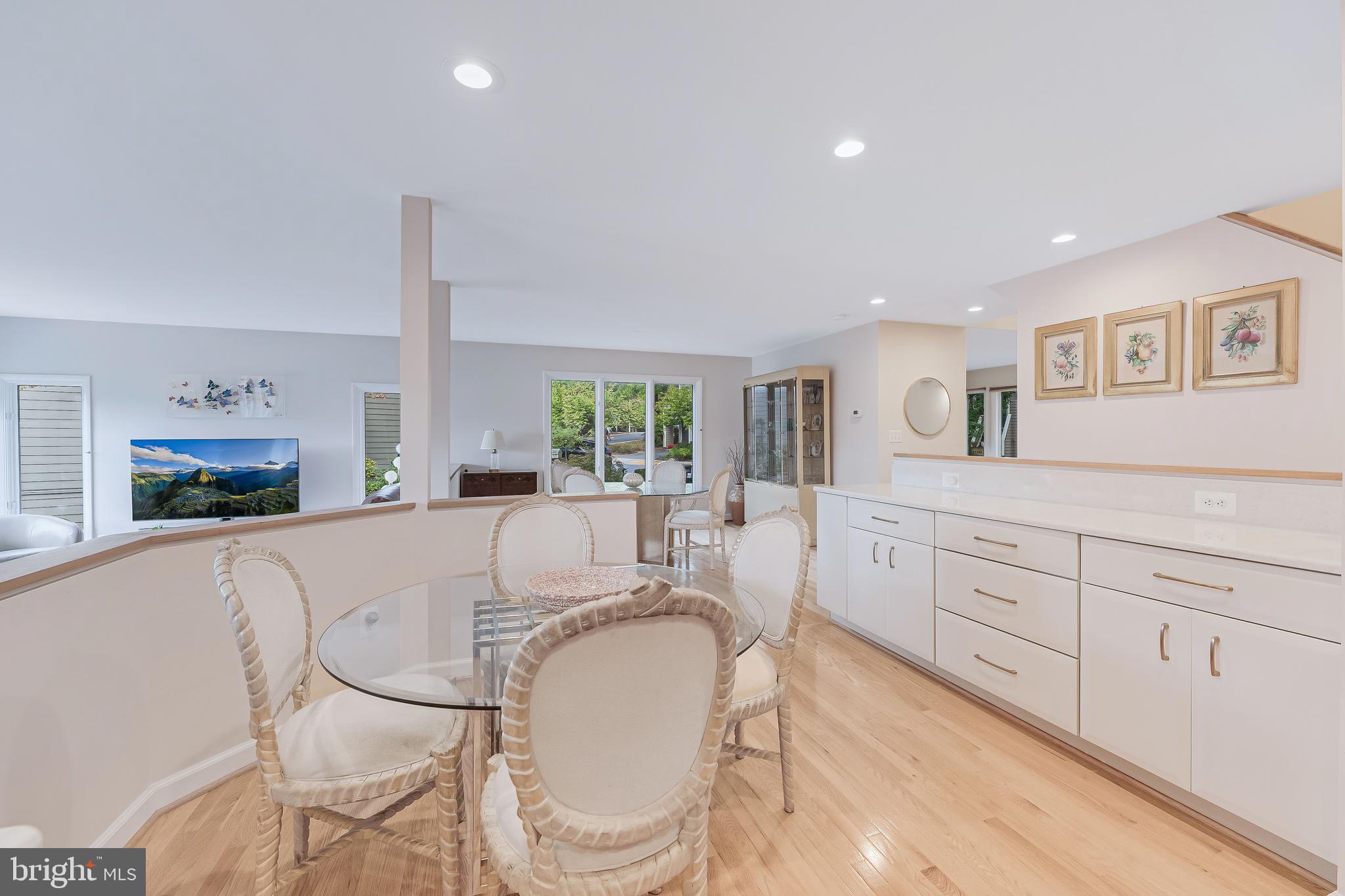 1933 Lakeport Way Reston, VA 20191 - Photo 14 of 57 a living room with furniture a fireplace and a flat screen tv