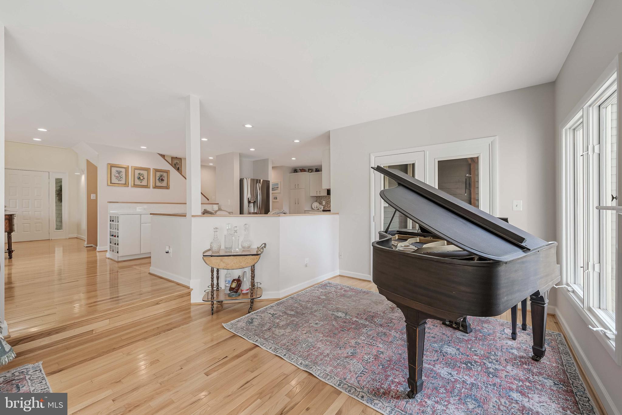 1933 Lakeport Way Reston, VA 20191 - Photo 22 of 57 a living room with furniture and a wooden floor