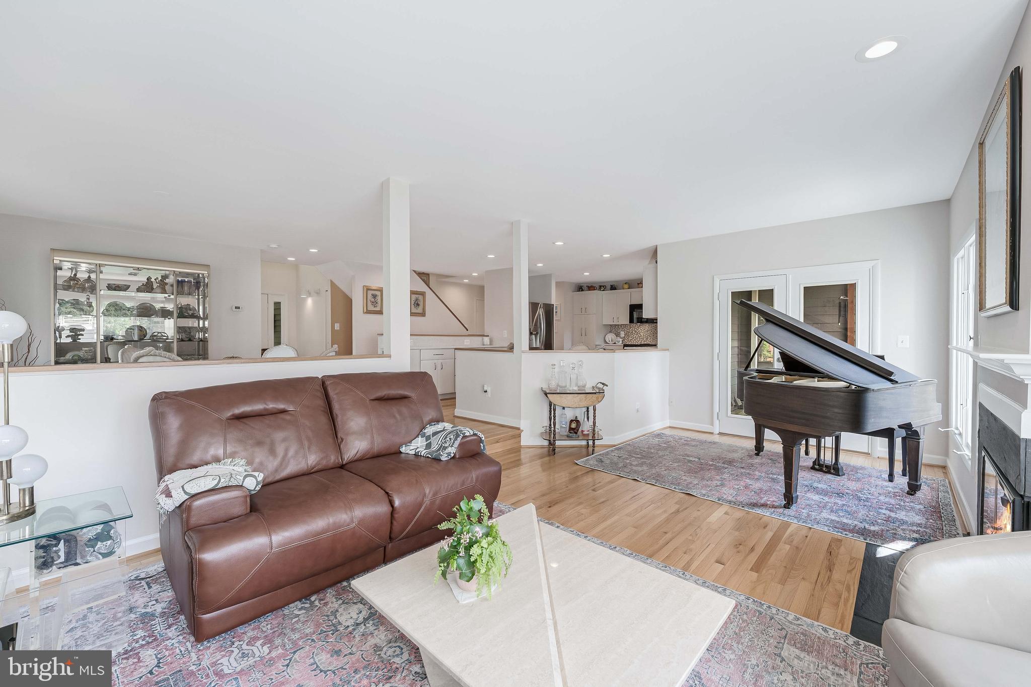 1933 Lakeport Way Reston, VA 20191 - Photo 27 of 57 a living room with furniture and a wooden floor
