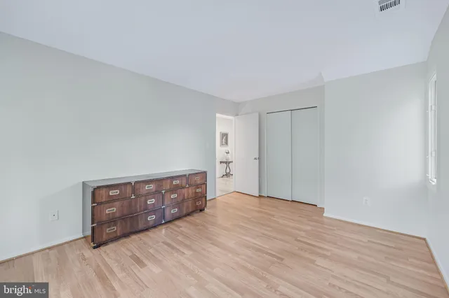 a view of dining room with furniture and floor to ceiling window