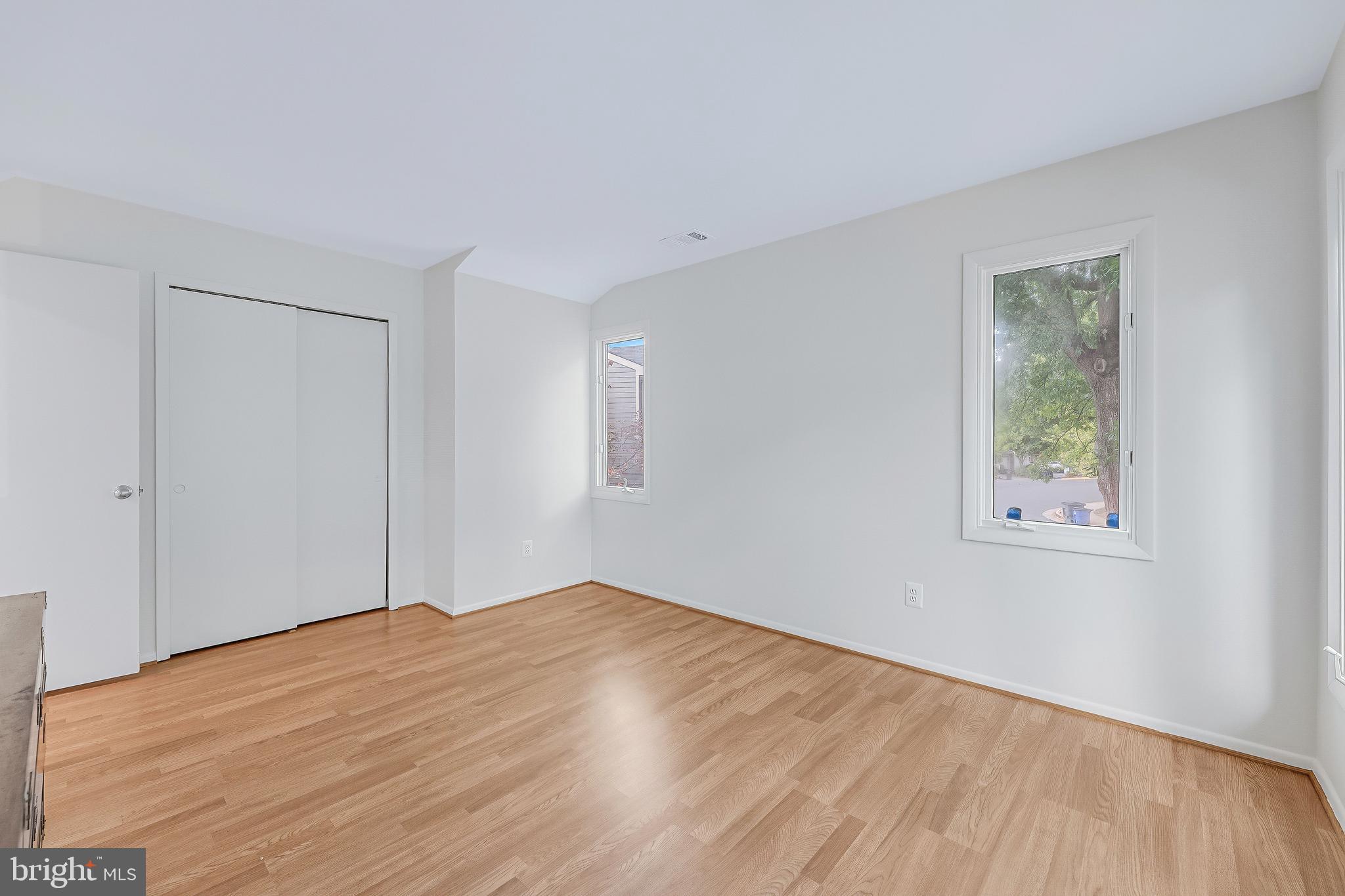 1933 Lakeport Way Reston, VA 20191 - Photo 46 of 57 a view of empty room with wooden floor