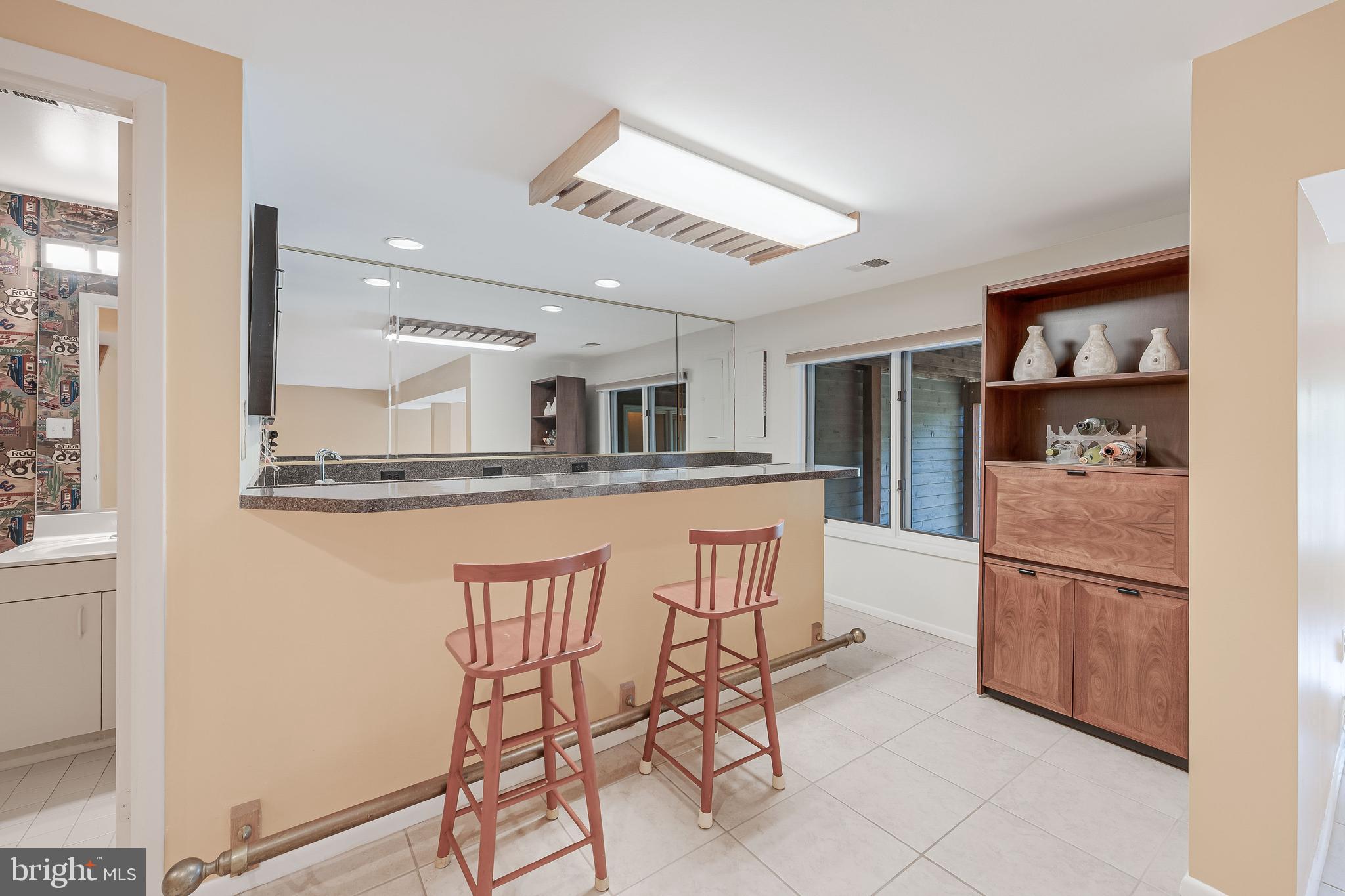 1933 Lakeport Way Reston, VA 20191 - Photo 52 of 57 a kitchen with stainless steel appliances granite countertop a refrigerator and a sink