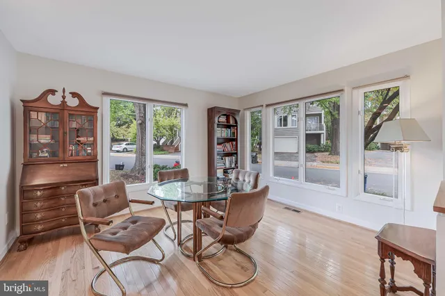 a view of a livingroom with furniture and wooden floor