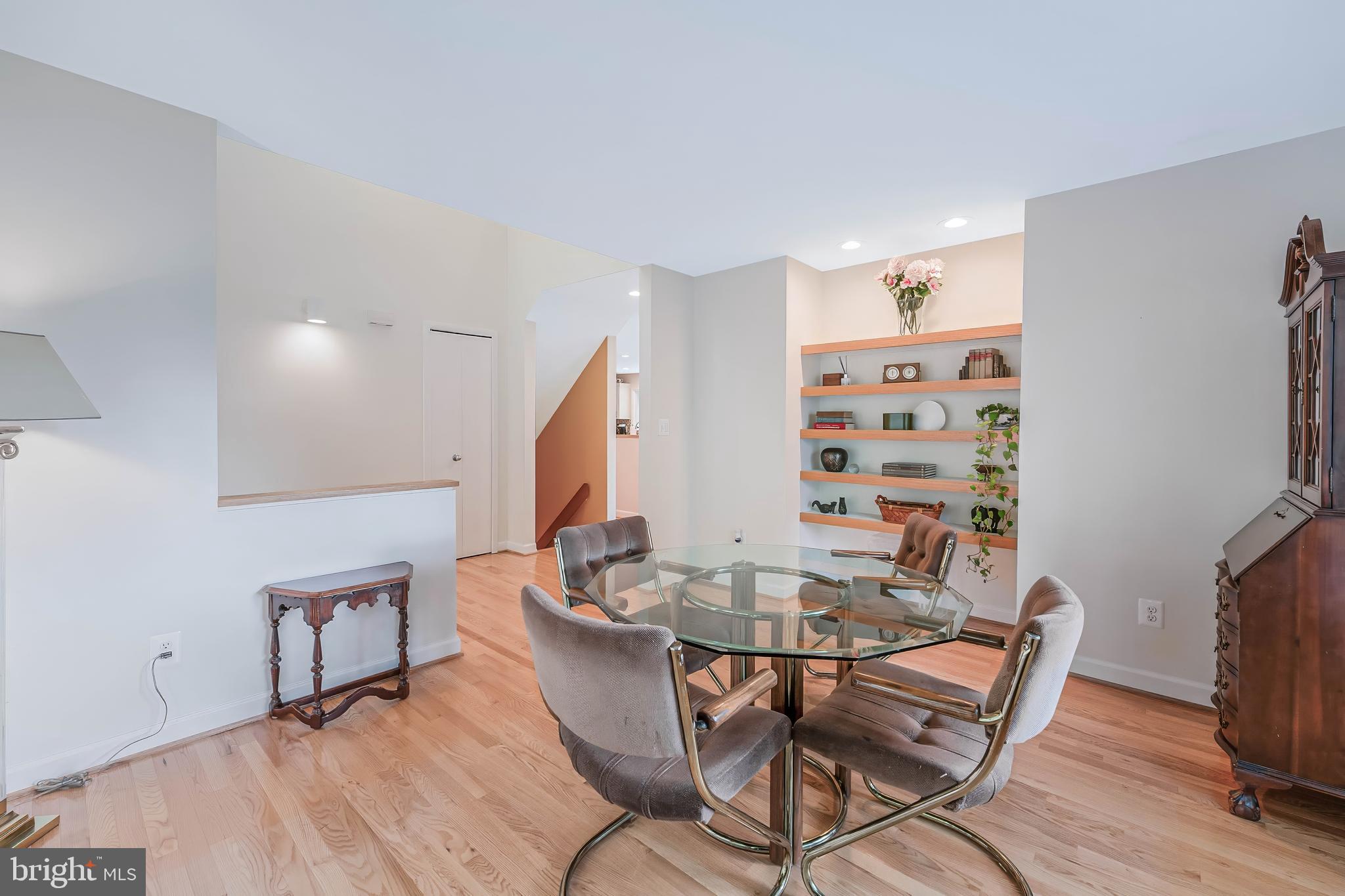 1933 Lakeport Way Reston, VA 20191 - Photo 7 of 57 a view of a dining room with furniture and wooden floor