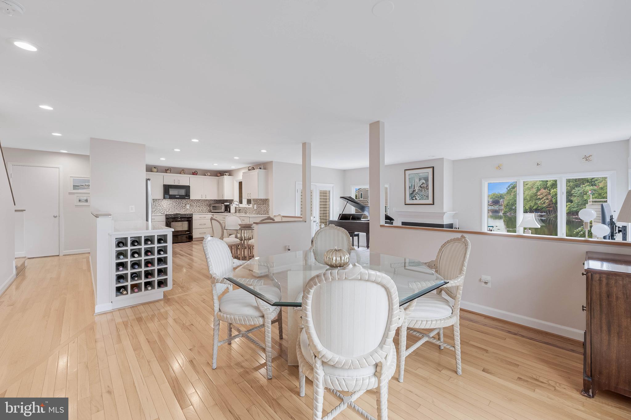 1933 Lakeport Way Reston, VA 20191 - Photo 9 of 57 a view of a dining room with furniture window and wooden floor