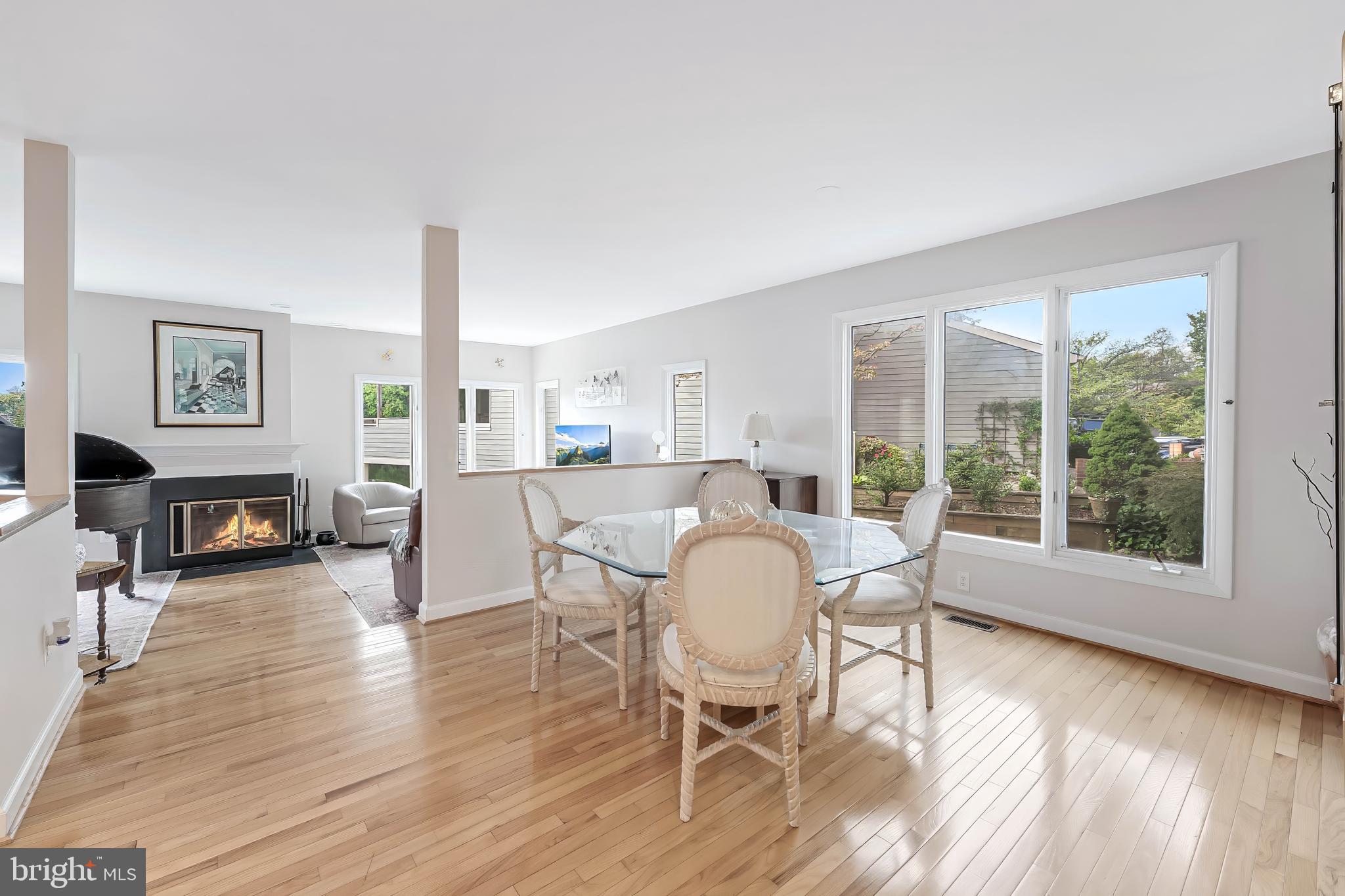 1933 Lakeport Way Reston, VA 20191 - Photo 10 of 57 a view of a dining room with furniture and wooden floor