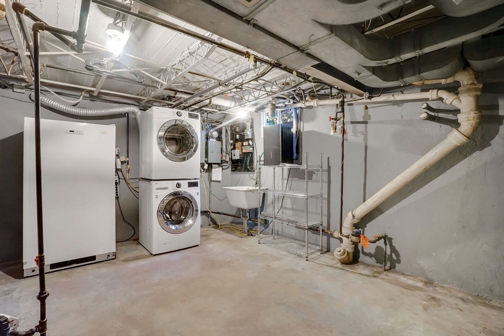 138 Abbott Street Springfield, MA 01118 - Photo 37 of 41 a utility room with dryer and washer