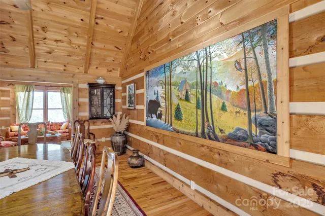 a view of a living room and a balcony