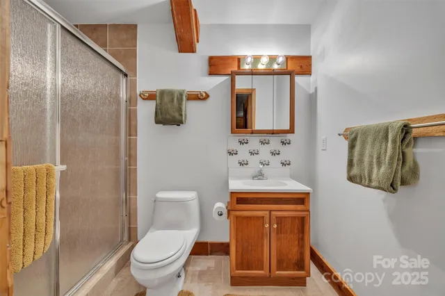 a bathroom with a toilet and a sink