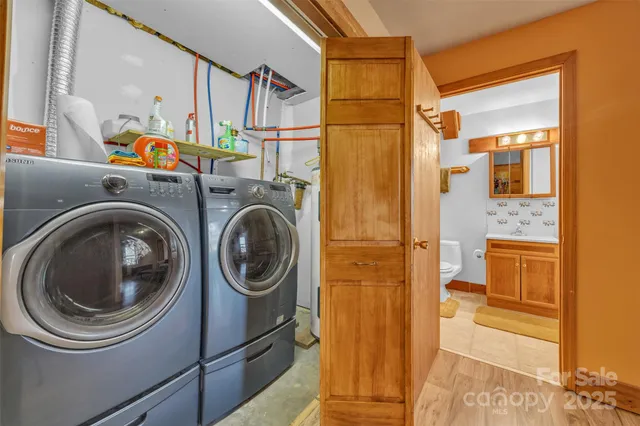 a utility room with dryer and washer