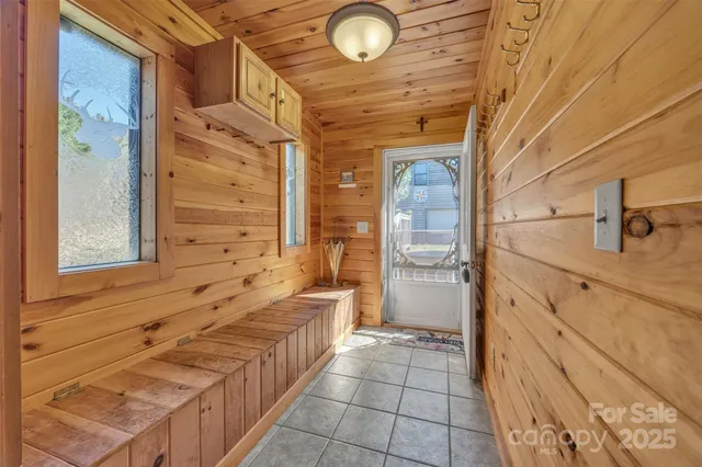 a bathroom with a sink a mirror and a shower