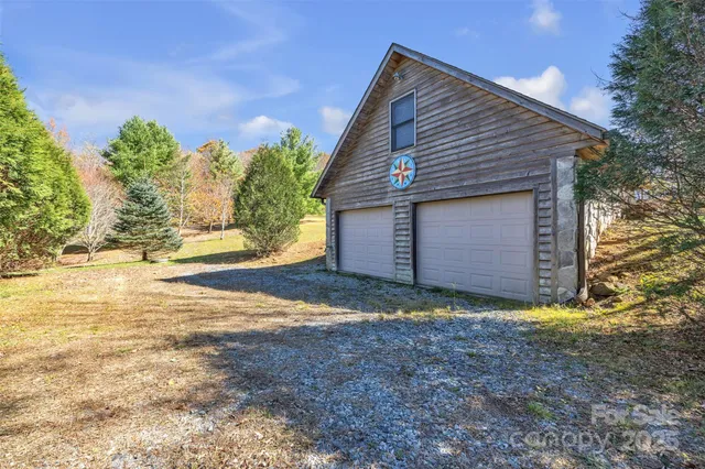 a view of a backyard of the house