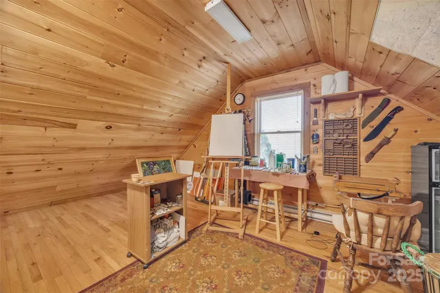 a view of a patio with table and chairs