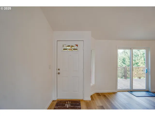 a view of an empty room and window