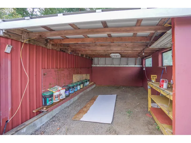 a view of a garage with parked cars